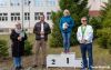 Biegacze stoją na podium